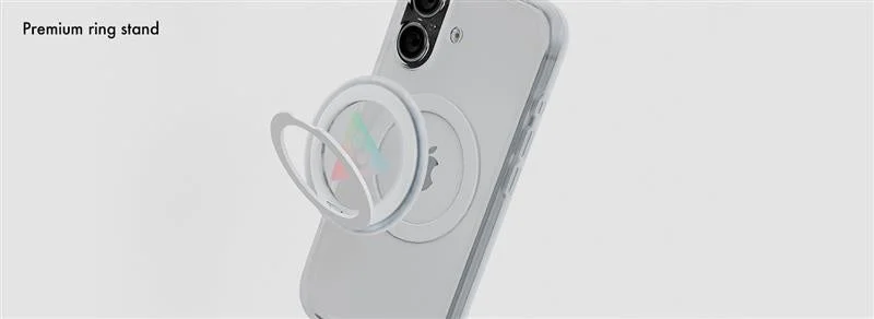 白いスマートフォン（iPhoneと推測）の背面に白いリングスタンドが装着され、立てて使用できる状態が示されている画像